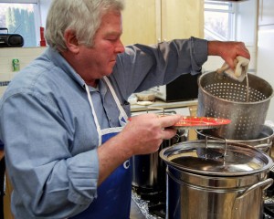 Greg Herrling prepares lutefisk
